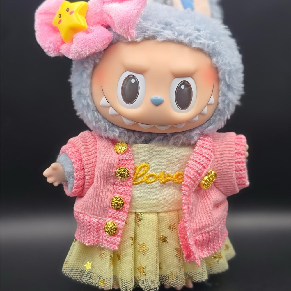 Adorable Pink and Yellow Doll with Star Accessories